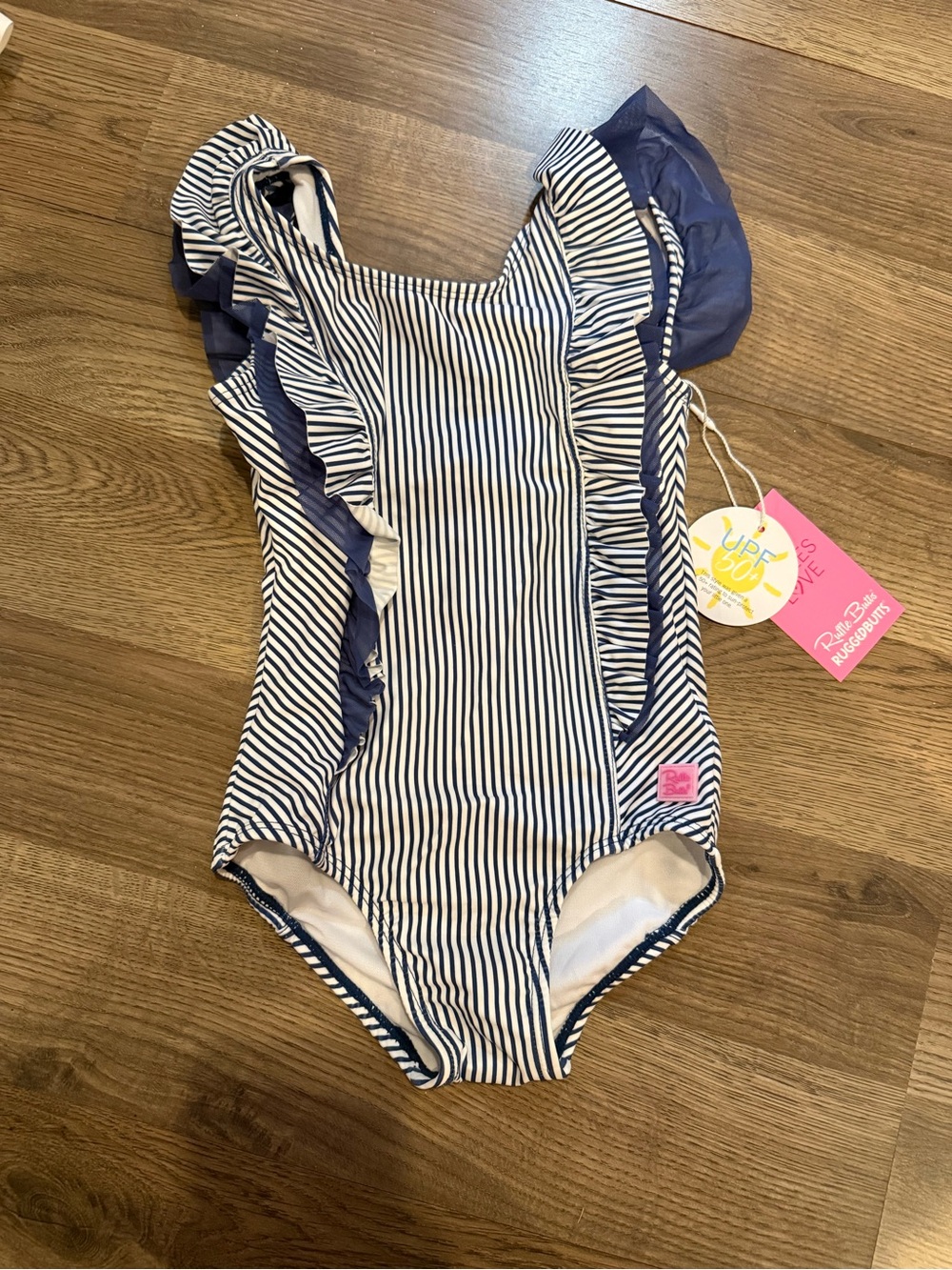 Girls Navy & White striped Rufflebutts swimsuit